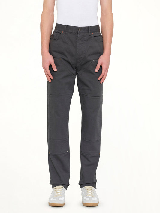 Image of a model wearing Pants. Product name - Patch Pants in Anthracite colour by brand - LANVIN