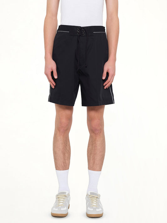 Image of a model wearing Shorts. Product name - Short Loose Belt in Navy colour by brand - LANVIN