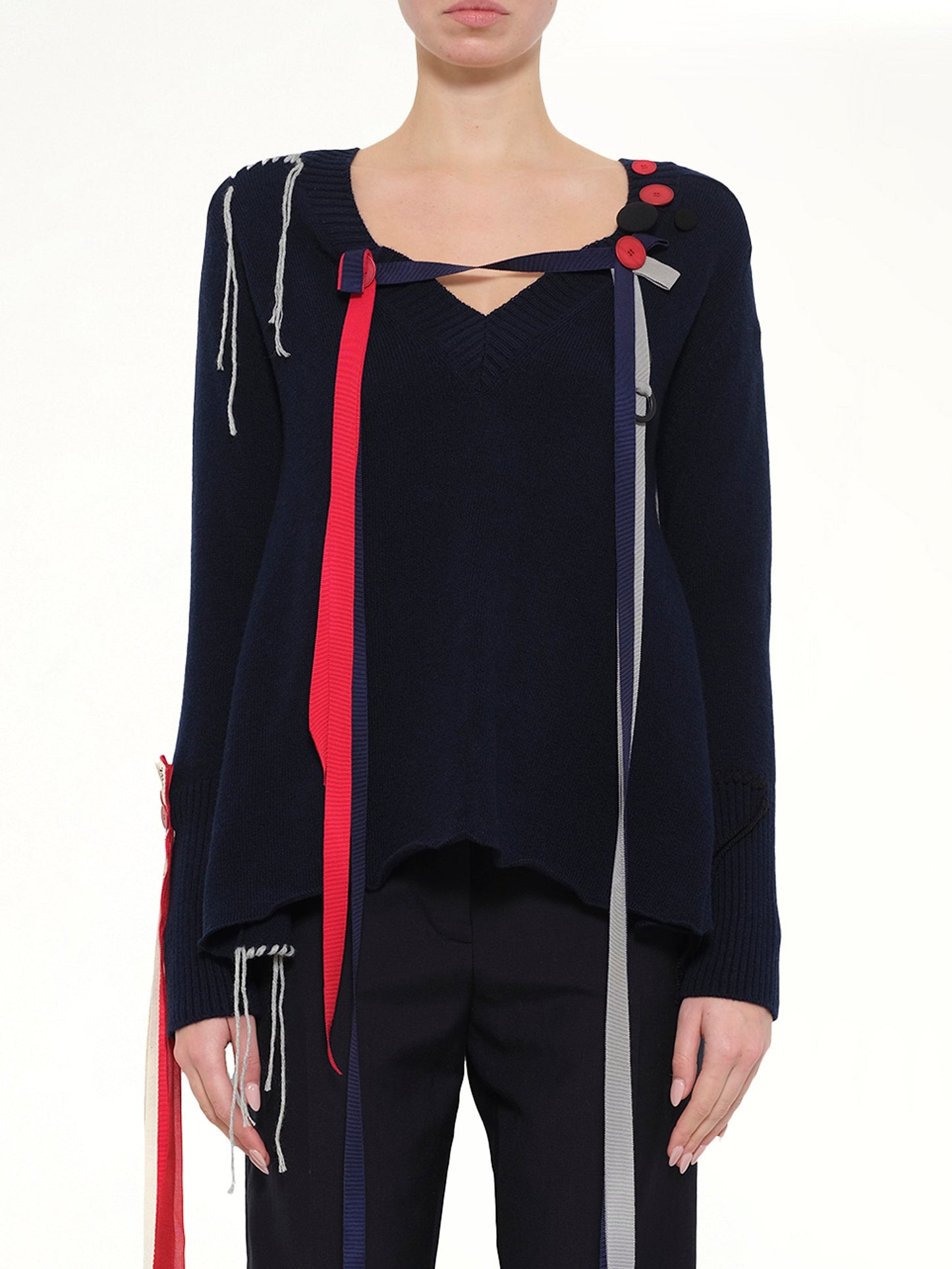 Image of a model wearing Outerwear. Product name - V Neck Ribbons Sweater in Navy colour by brand - LOEWE