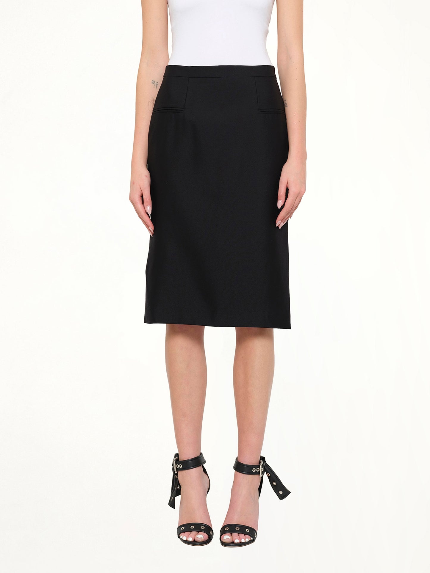 Image of a model wearing Skirts. Product name - Alexander McQueen Skirt in Black colour by brand - ALEXANDER MCQUEEN
