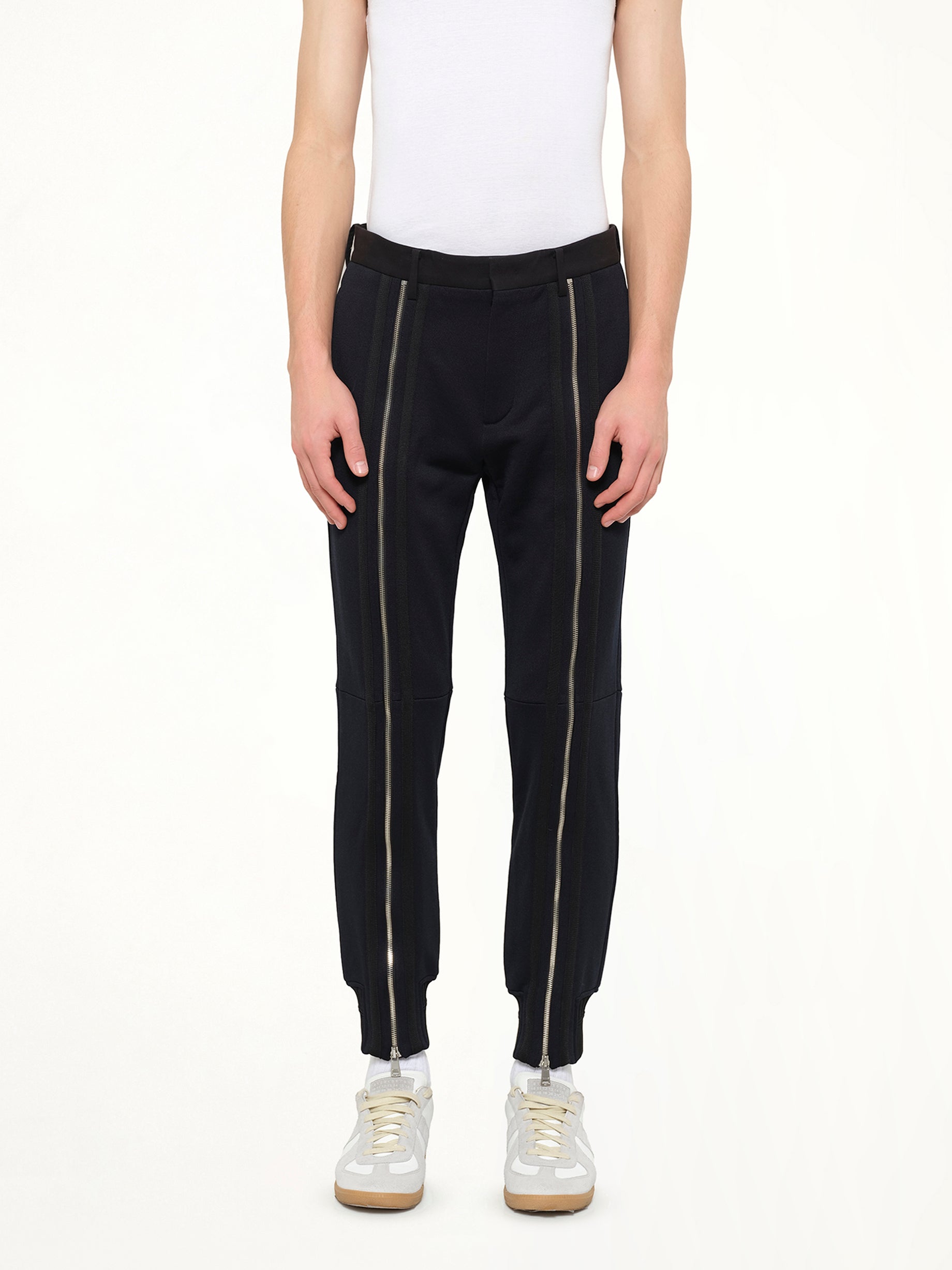 Image of a model wearing Pants. Product name - Pants in Black colour by brand - JUUNJ