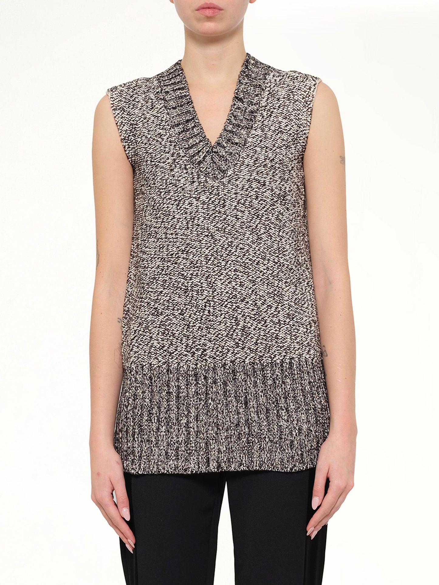 Image of a model wearing Outerwear. Product name - Lanvin Knitted Top in White colour by brand - LANVIN