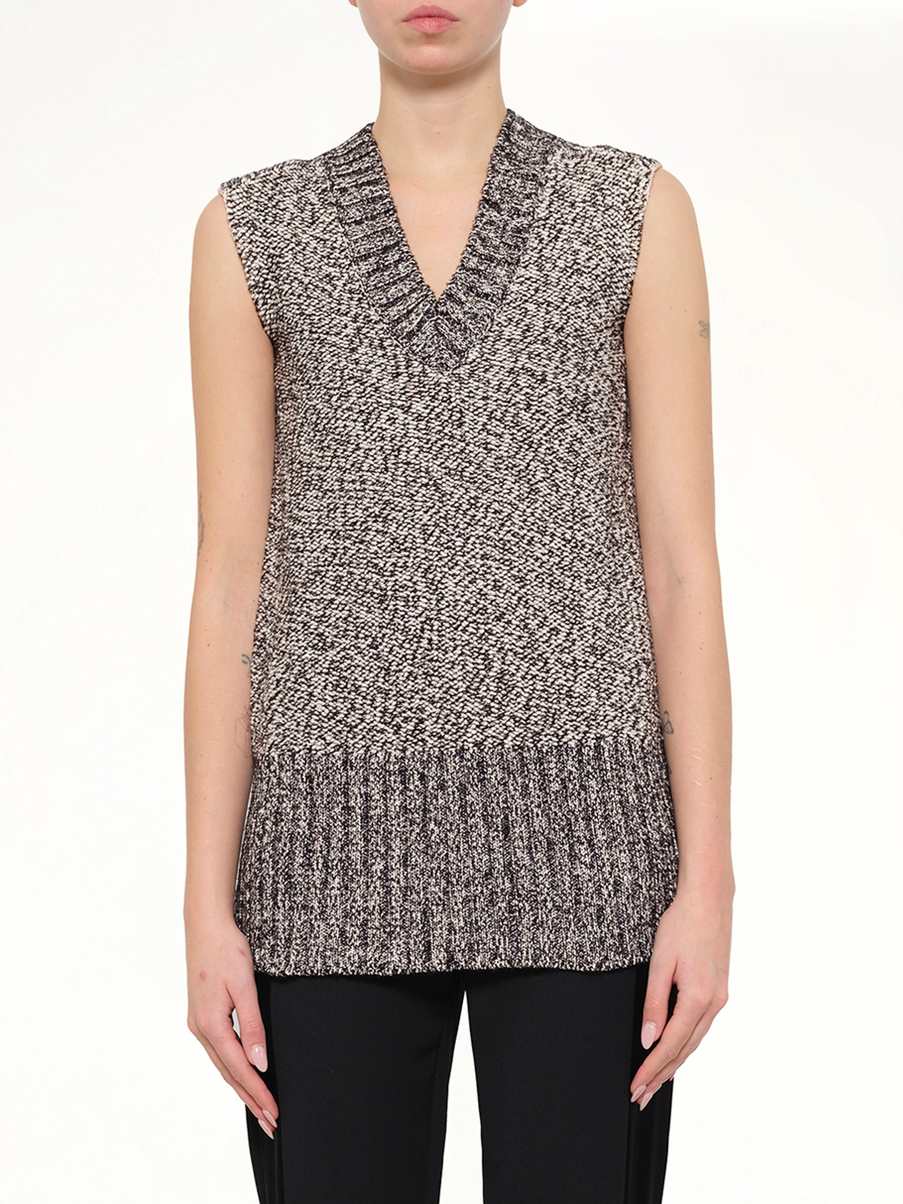 Image of a model wearing Outerwear. Product name - Lanvin Knitted Top in White colour by brand - LANVIN