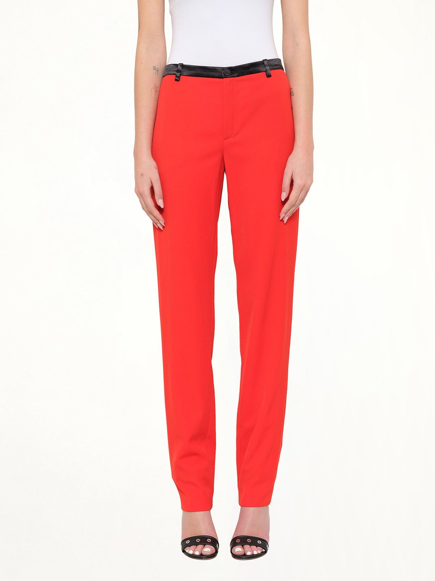 Image of a model wearing Pants. Product name - Pants in Geranium colour by brand - LANVIN