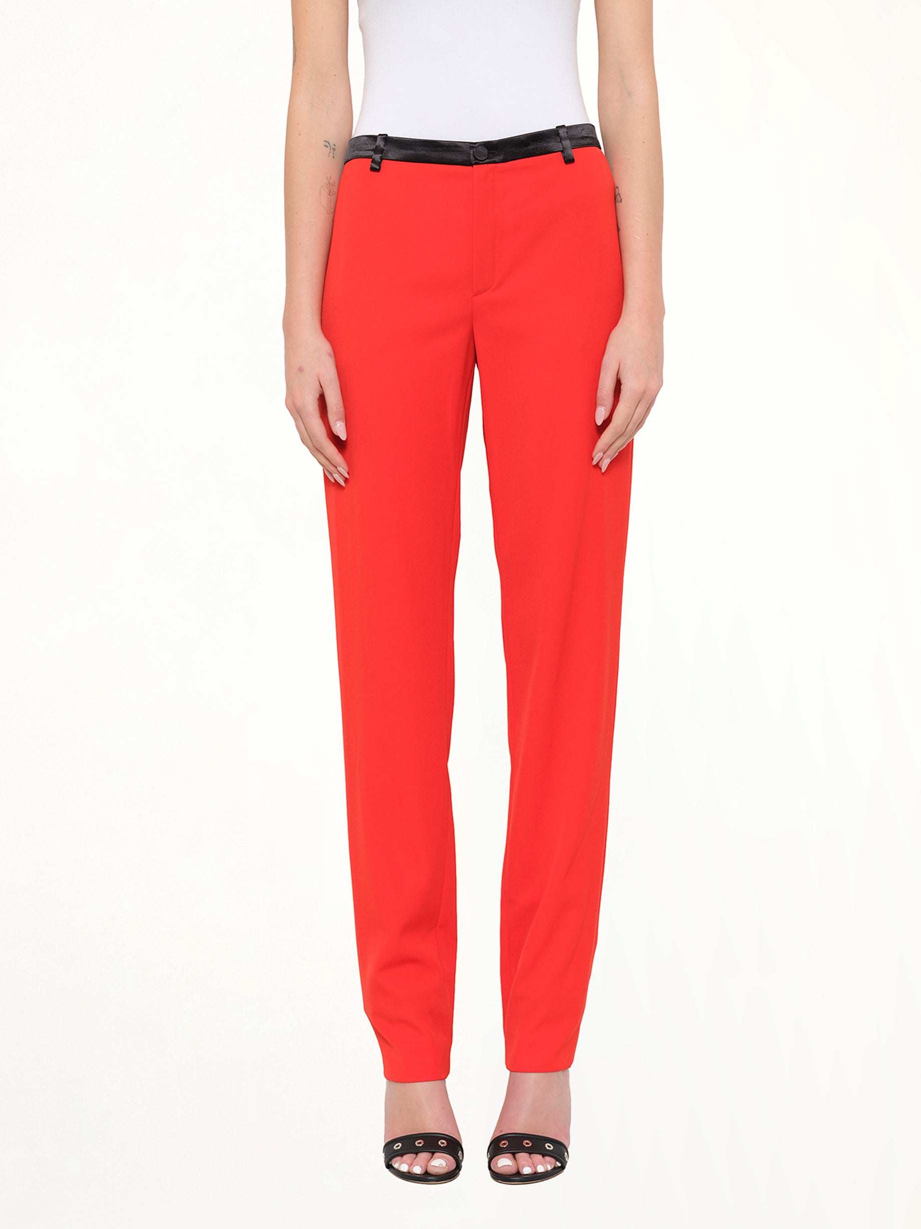 Image of a model wearing Pants. Product name - Pants in Geranium colour by brand - LANVIN