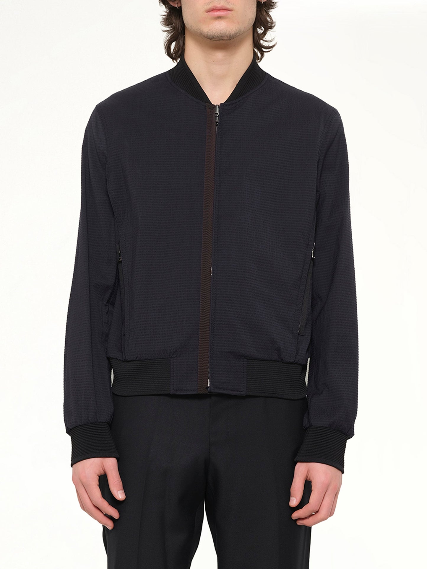 Image of a model wearing Outerwear. Product name - Wooyoungmi Jumper in Navy colour by brand - WOOYOUNGMI