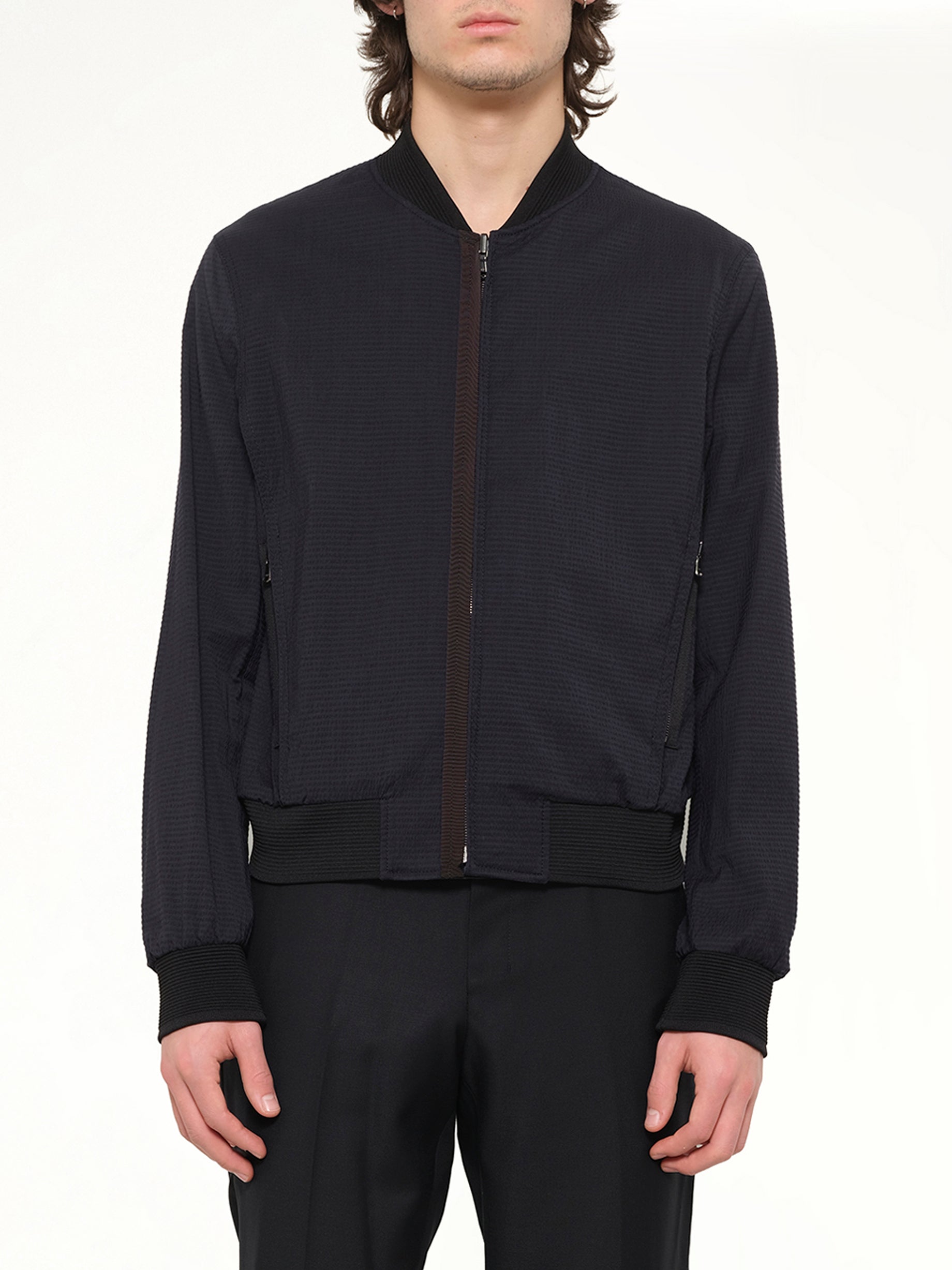 Image of a model wearing Outerwear. Product name - Wooyoungmi Jumper in Navy colour by brand - WOOYOUNGMI