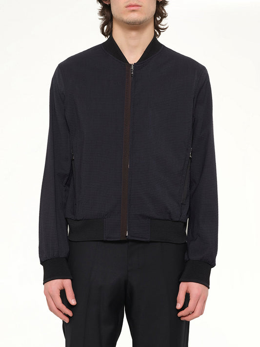 Image of a model wearing Outerwear. Product name - Wooyoungmi Jumper in Navy colour by brand - WOOYOUNGMI