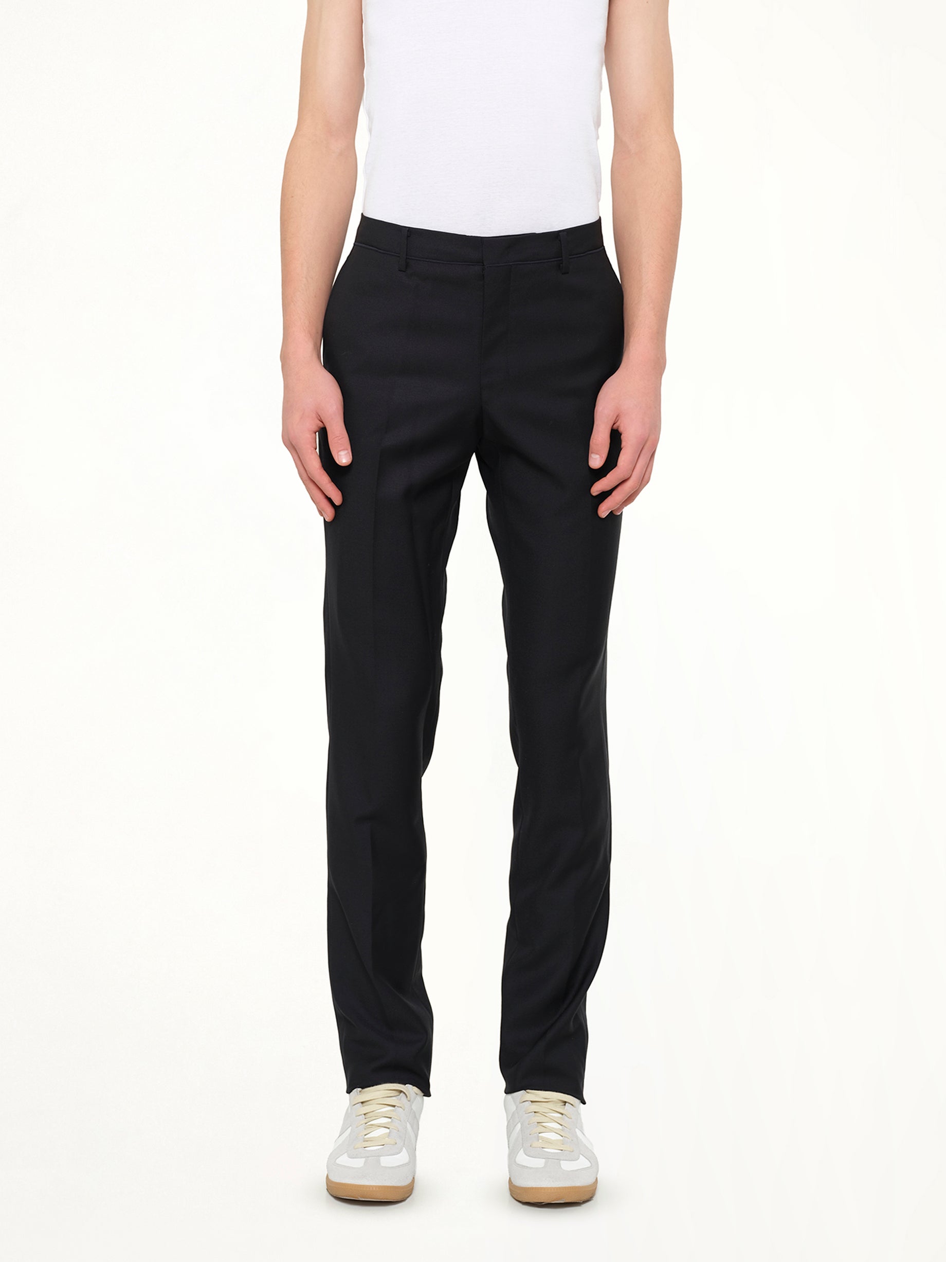 Image of a model wearing Pants. Product name - Wooyoungmi Suit Pant in Navy colour by brand - WOOYOUNGMI
