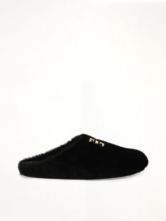 Image of Sandals. Product name - 4G Shearling Slip On in Black colour by brand - GIVENCHY
