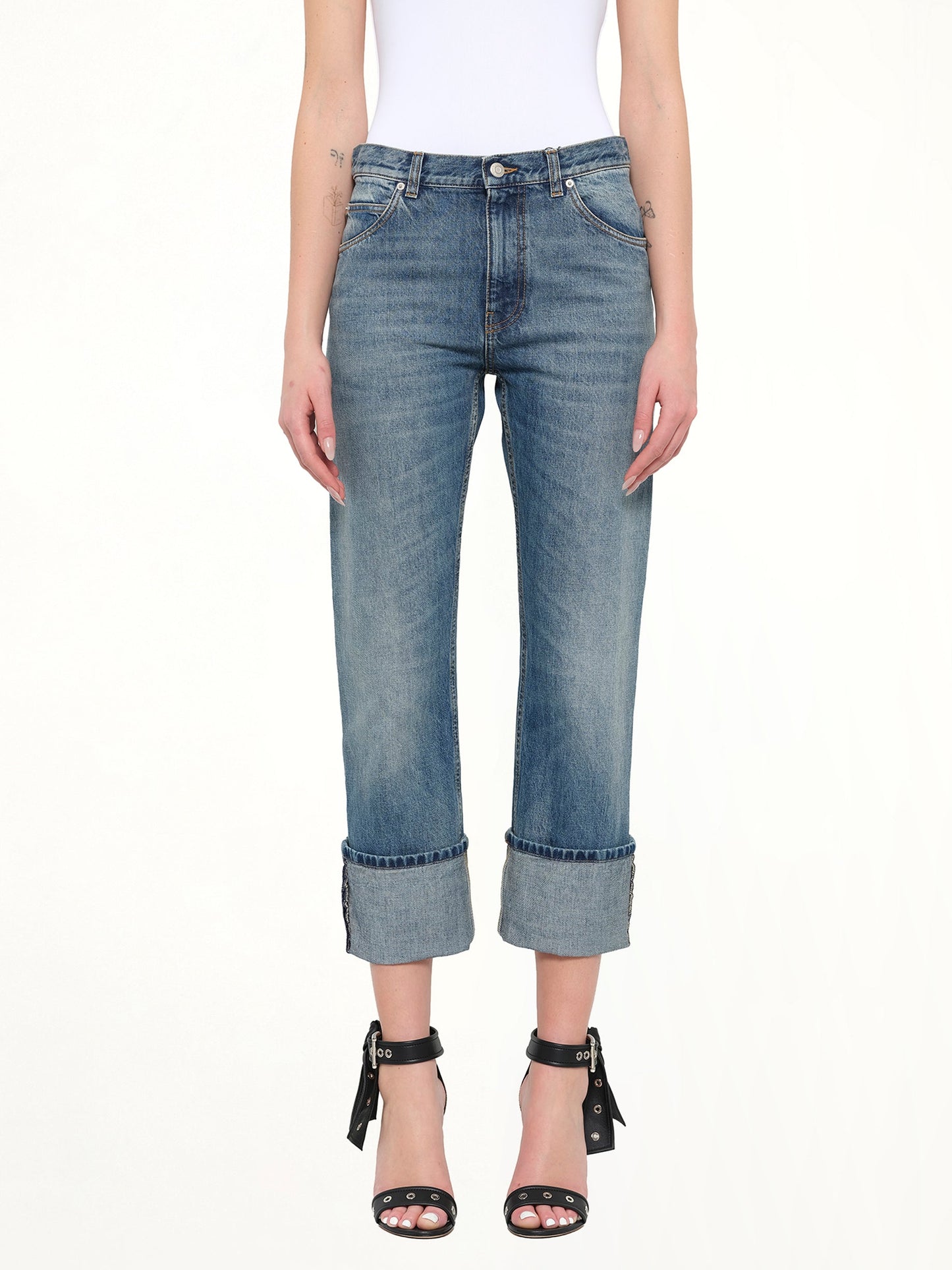 Image of a model wearing Pants. Product name - Alexander McQueen Pants in 4250 colour by brand - ALEXANDER MCQUEEN