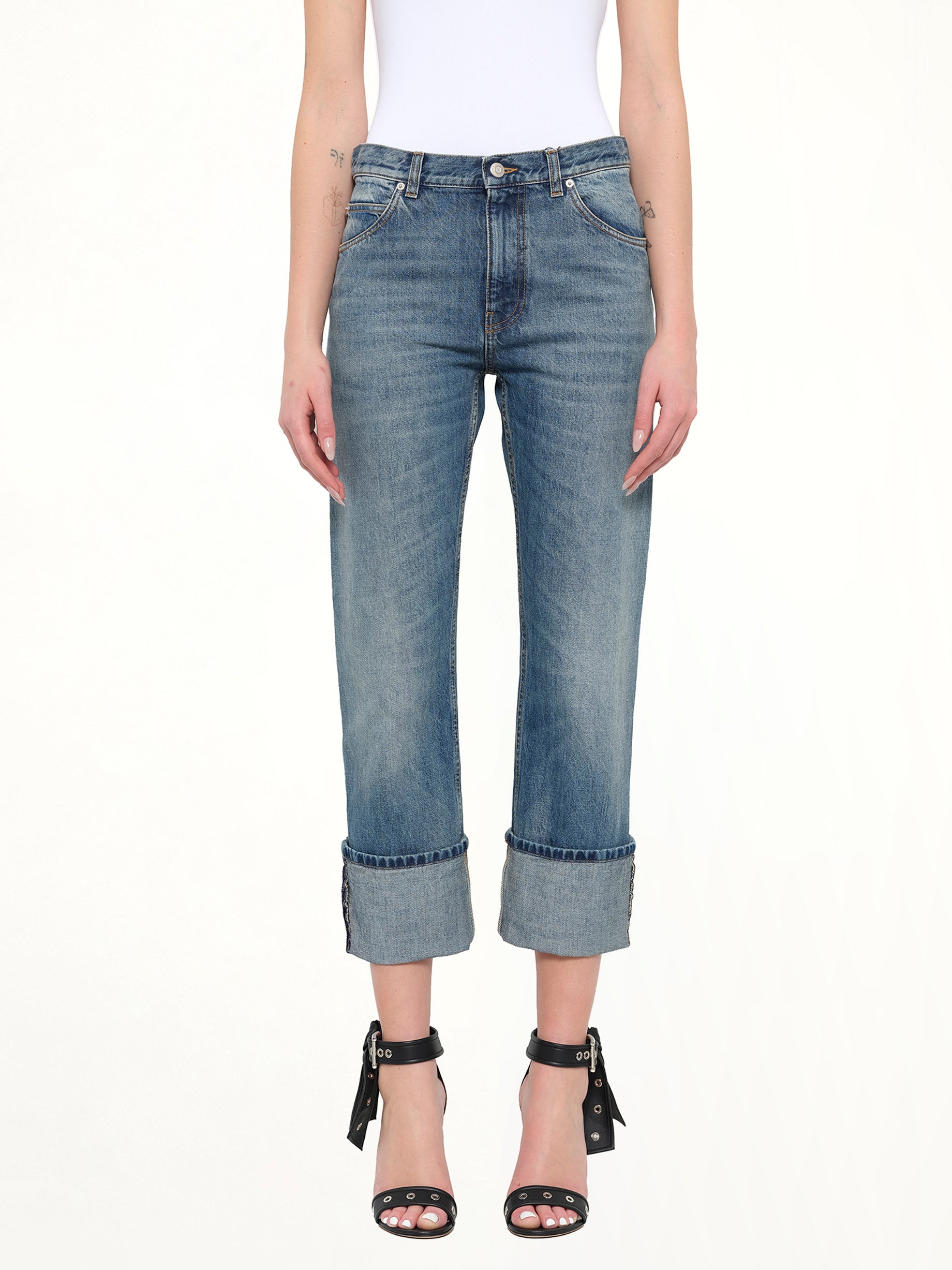 Image of a model wearing Pants. Product name - Alexander McQueen Pants in 4250 colour by brand - ALEXANDER MCQUEEN