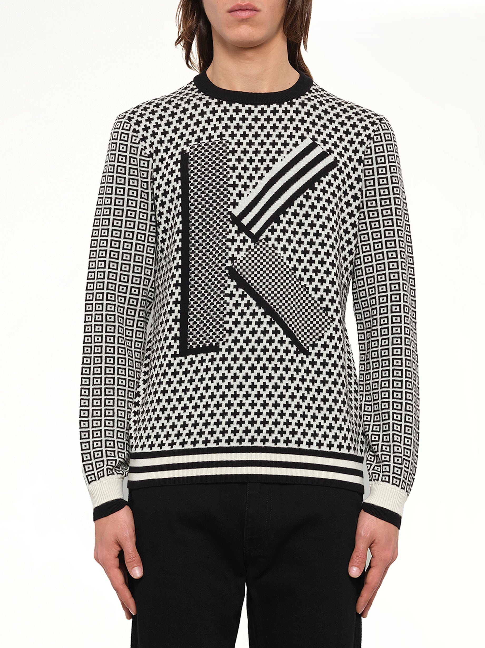 Image of a model wearing Outerwear. Product name - Fairisle Jumper in Black colour by brand - KENZO