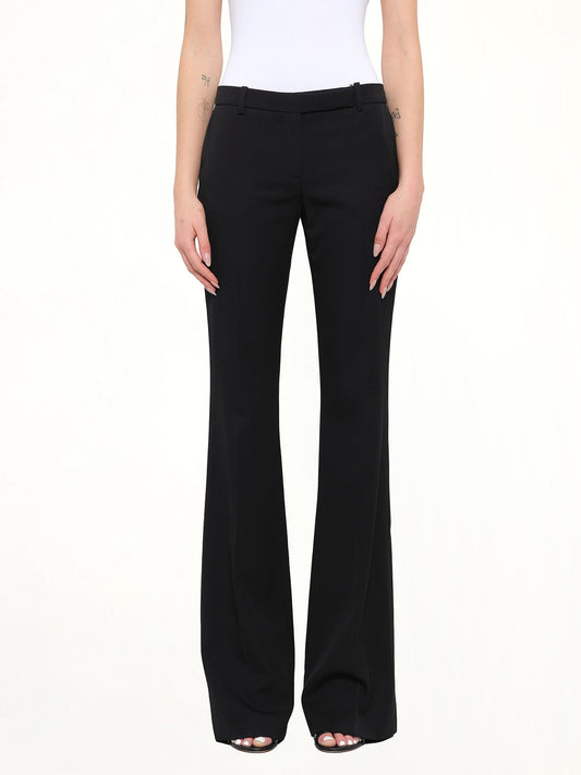 Image of a model wearing Pants. Product name - GDP Pants in Black colour by brand - ALEXANDER MCQUEEN