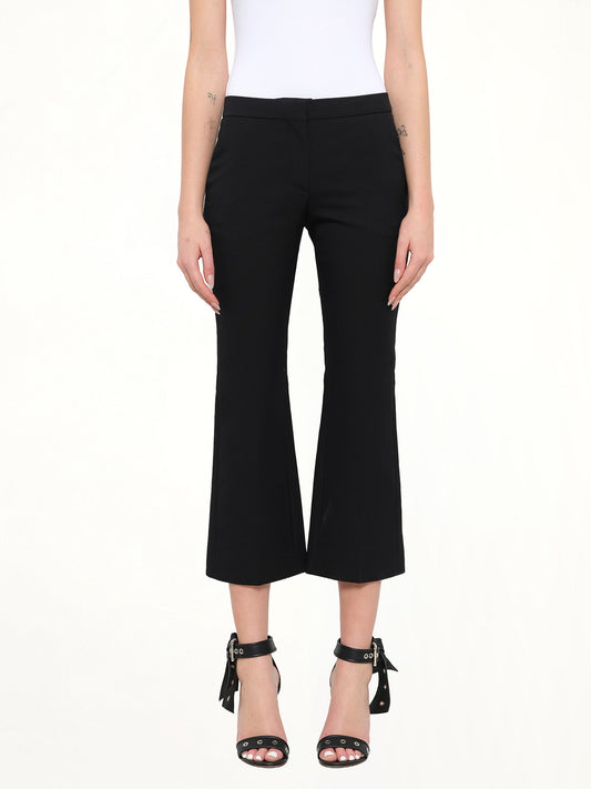 Image of a model wearing Pants. Product name - Kickbacks Pant in Black colour by brand - ALEXANDER MCQUEEN