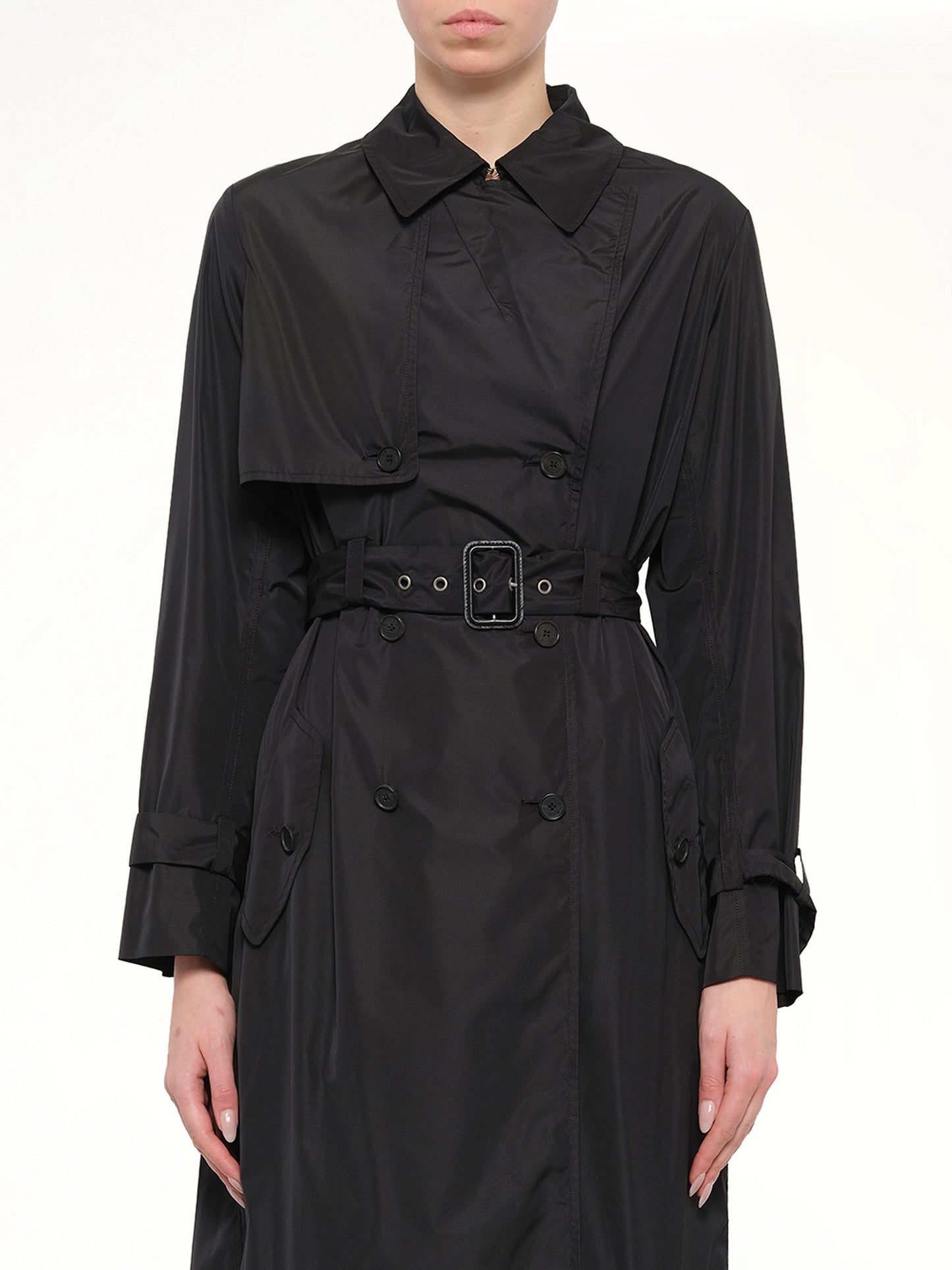 Image of a model wearing Outerwear. Product name - Oversize Trench in Black colour by brand - KENZO