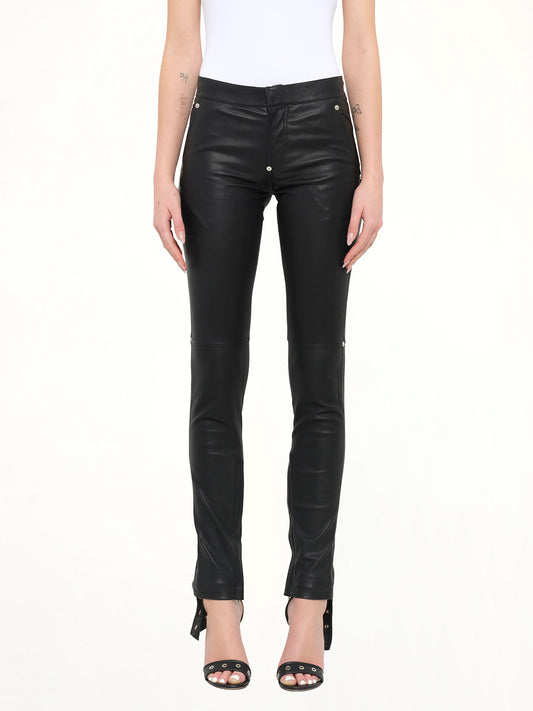 Image of a model wearing Pants. Product name - Givenchy Leather Trousers in Black colour by brand - GIVENCHY