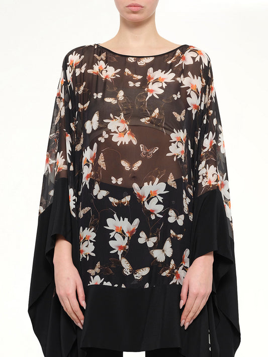 Image of a model wearing Skirts. Product name - Long Sleeve Top in Black colour by brand - GIVENCHY