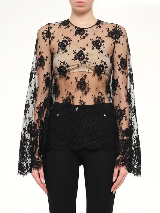 Image of a model wearing Tops. Product name - Podium Long Sleeve Tops in Black colour by brand - GIVENCHY