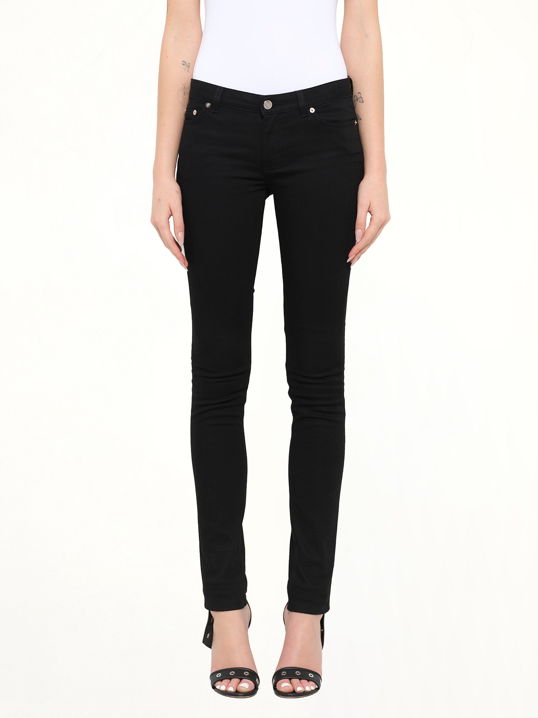 Image of a model wearing Pants. Product name - Trousers Denim in Black colour by brand - GIVENCHY