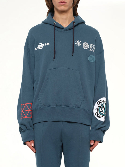 Image of a model wearing Outerwear. Product name - Anarchy Hoodie in Navy colour by brand - FACETASM