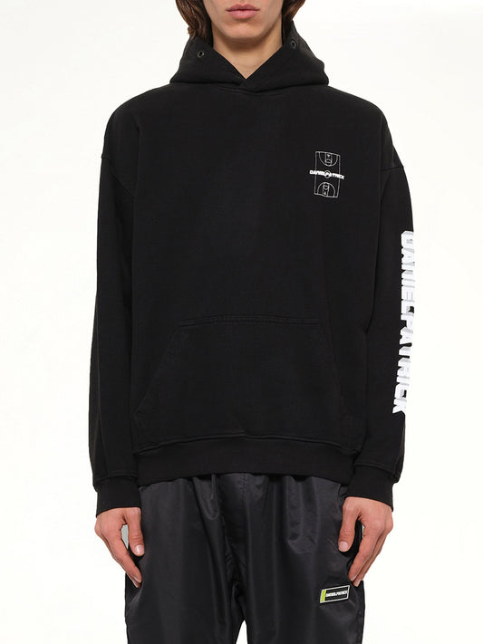 Image of a model wearing Outerwear. Product name - DP Court Hoodie in Black colour by brand - DANIEL PATRICK