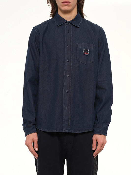 Image of a model wearing Tops. Product name - Denim Tiger Shirt in Navy colour by brand - KENZO
