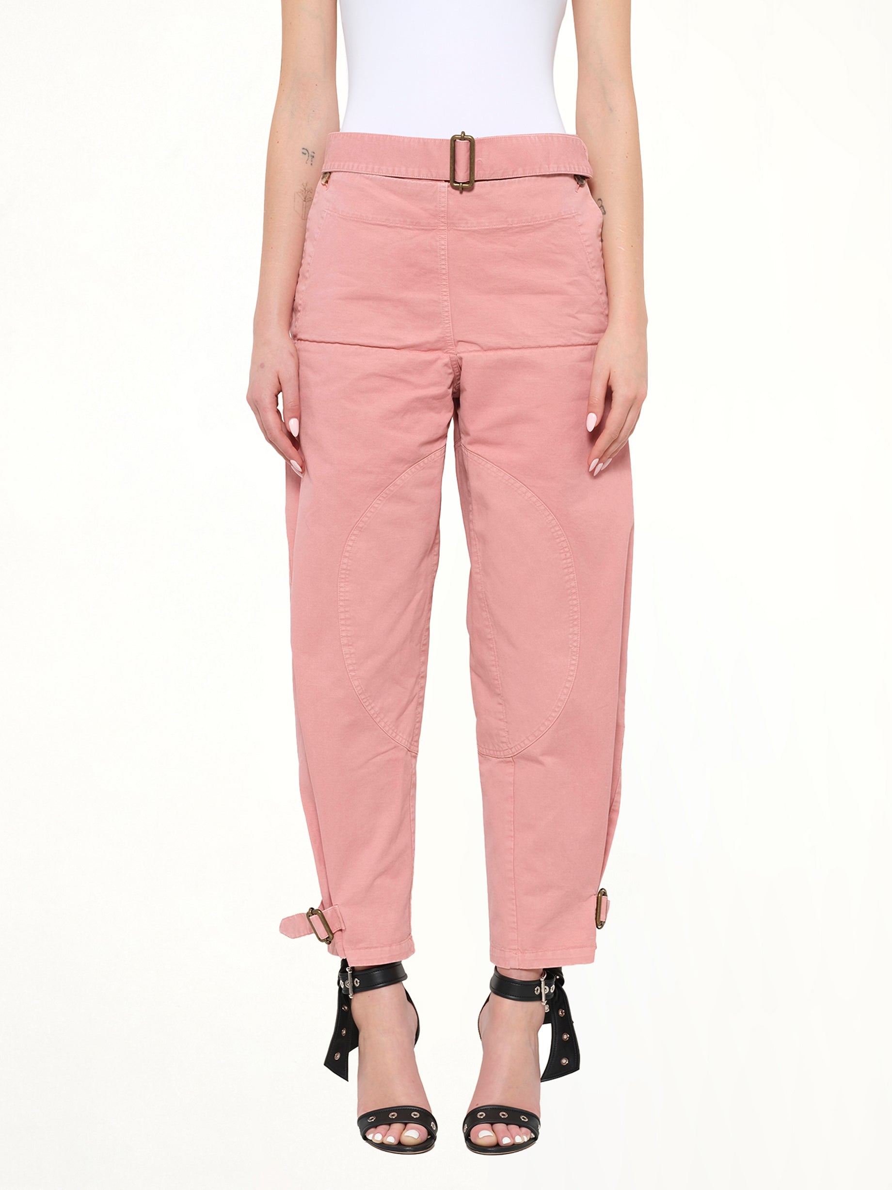 Image of a model wearing Pants. Product name - Fold Utility Trousers in Pink colour by brand - JWA