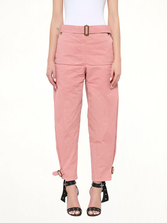 Image of a model wearing Pants. Product name - Fold Utility Trousers in Pink colour by brand - JWA