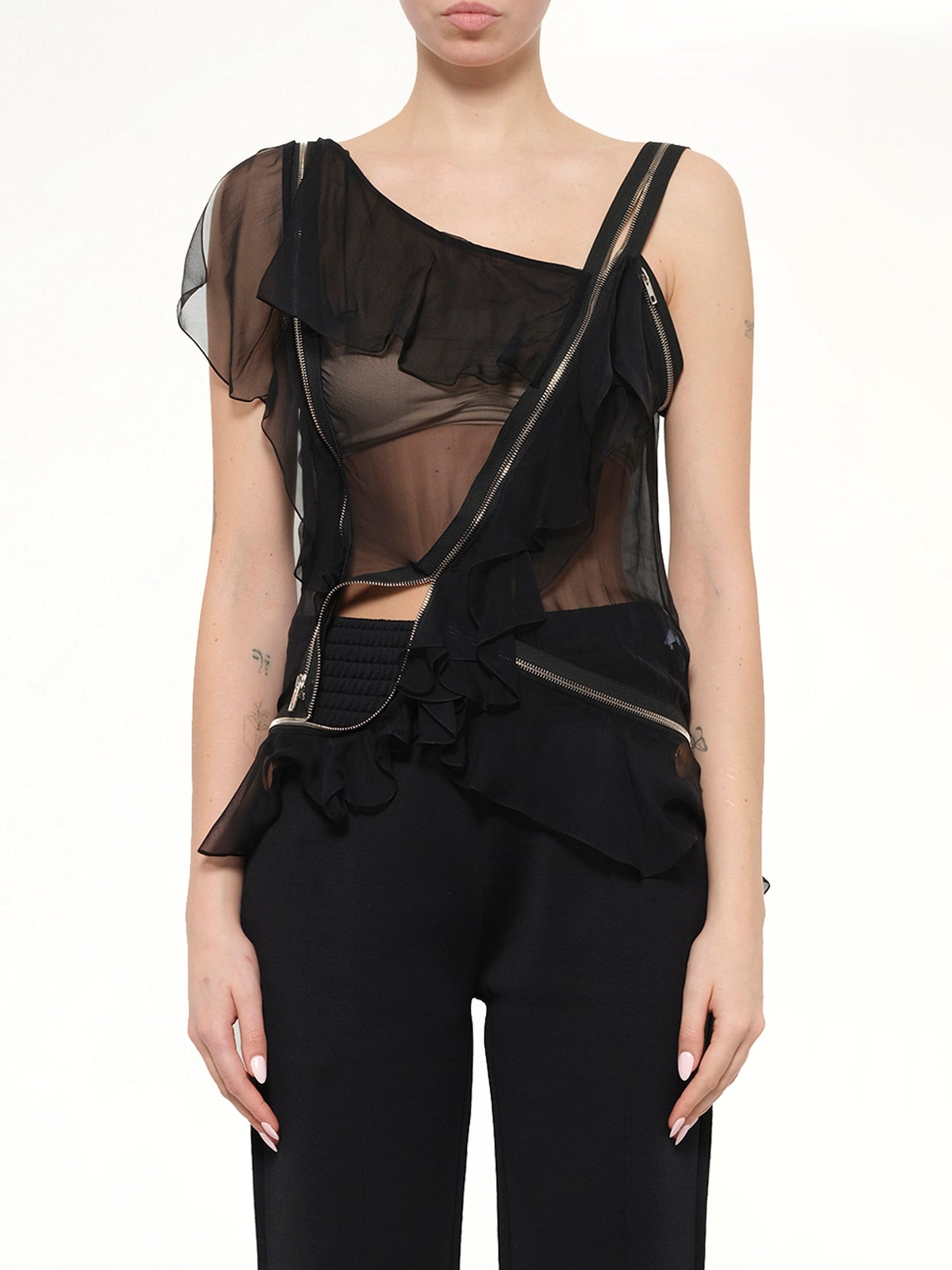 Image of a model wearing Tops. Product name - Givenchy Podium Sleeveless Top in Black colour by brand - GIVENCHY