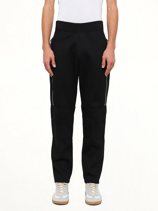 Image of a model wearing Pants. Product name - Givenchy Trousers in Black colour by brand - GIVENCHY