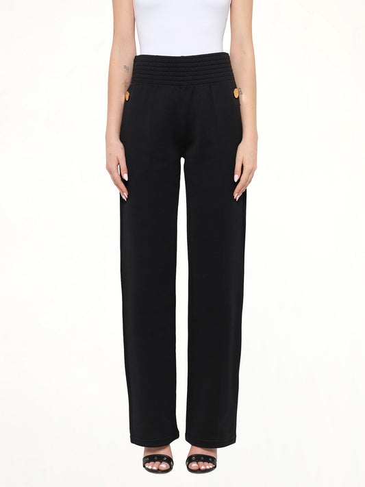 Image of a model wearing Pants. Product name - Givenchy Trousers in Black colour by brand - GIVENCHY