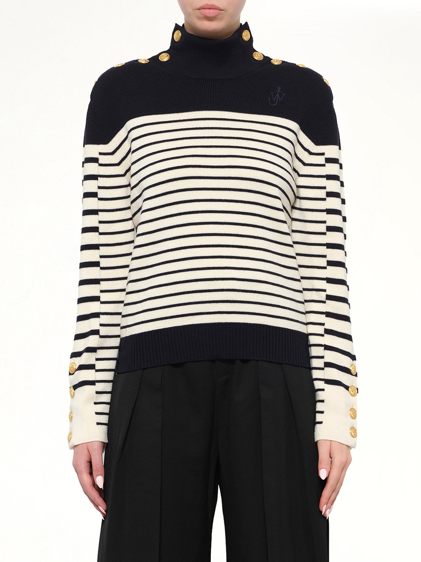Image of a model wearing Outerwear. Product name - JWA Multi Button Knit in Navy colour by brand - JWA