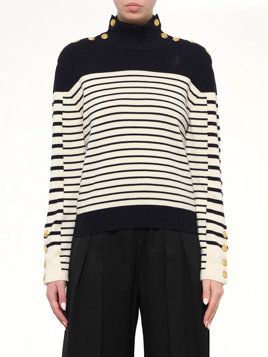 Image of a model wearing Outerwear. Product name - JWA Multi Button Knit in Navy colour by brand - JWA