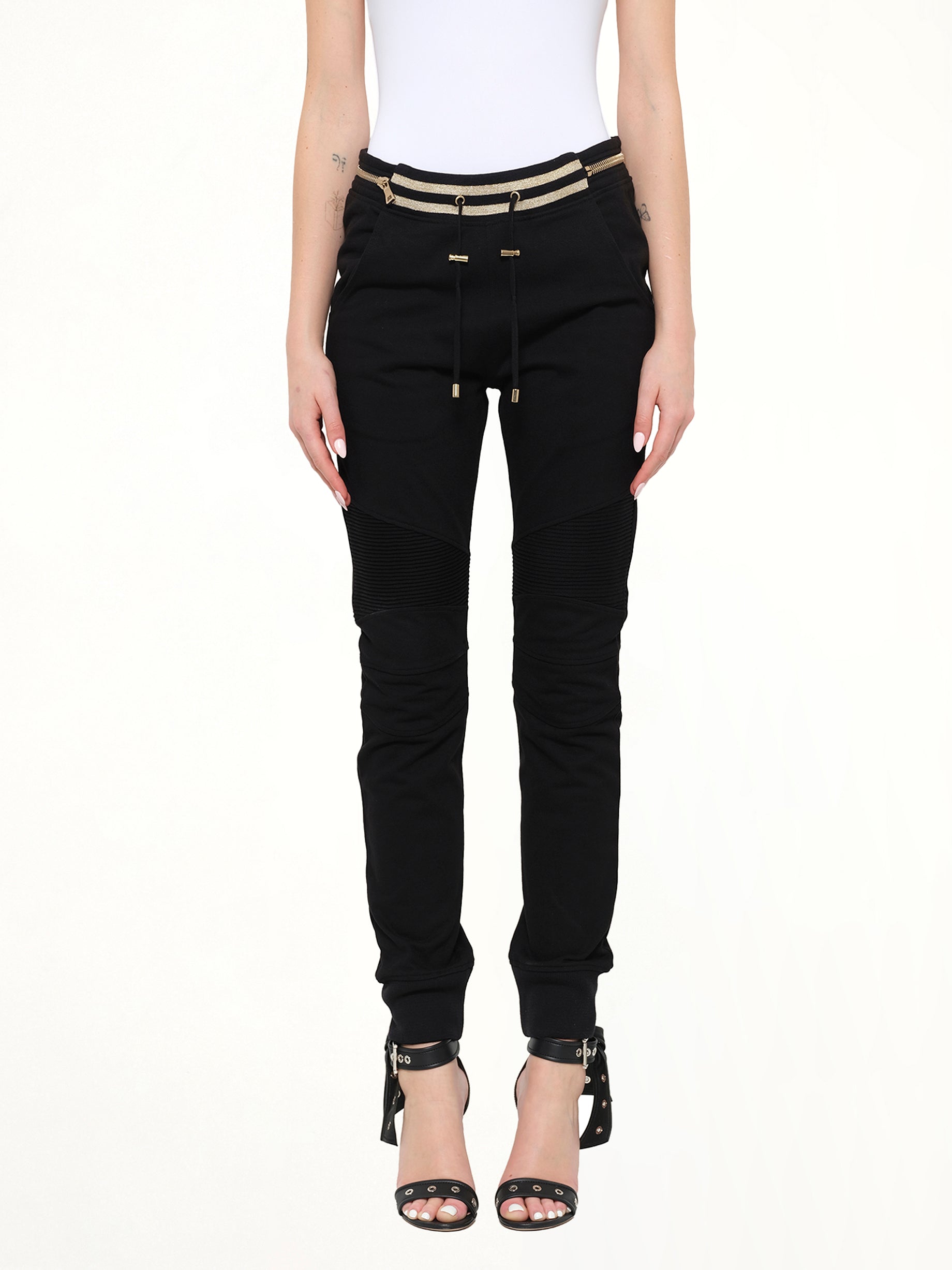Image of a model wearing Pants. Product name - Jersey Biker Zip in 176 colour by brand - BALMAIN