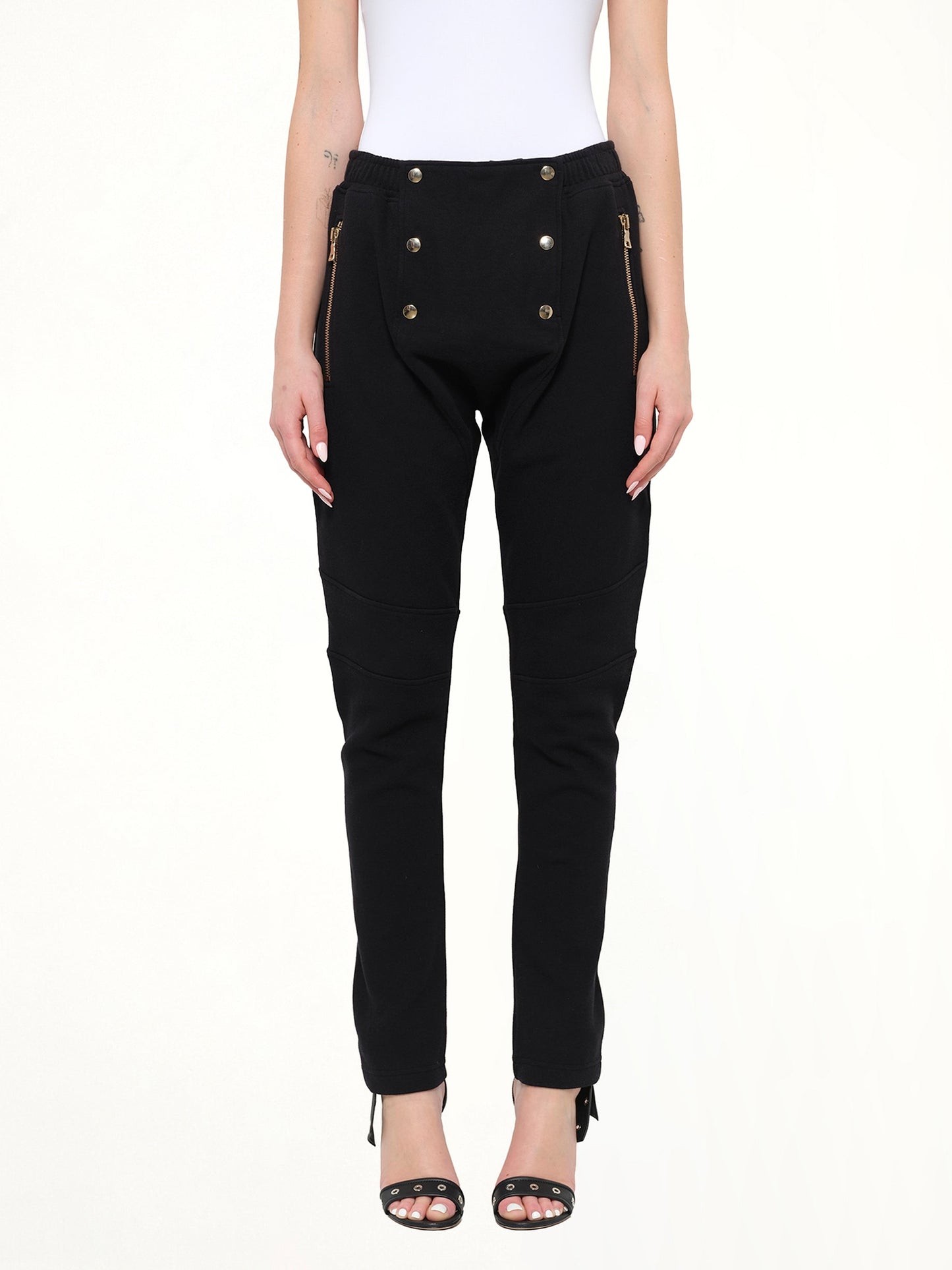Image of a model wearing Pants. Product name - Jersey Pont Pant in 176 colour by brand - BALMAIN