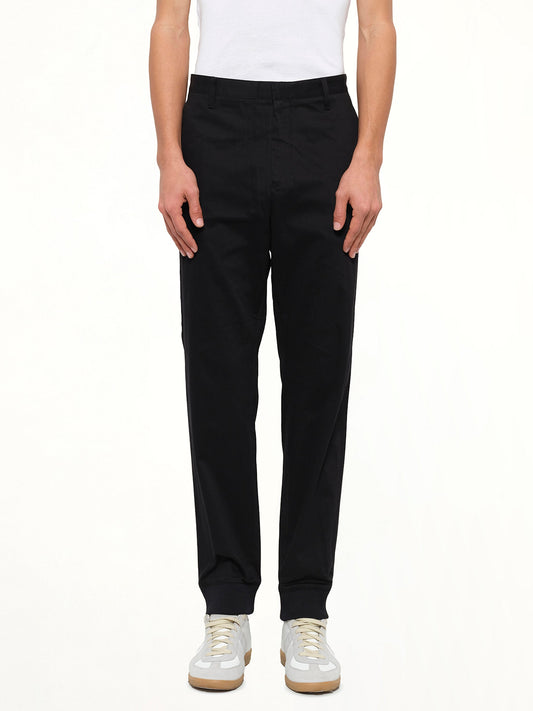 Image of a model wearing Pants. Product name - Jog Pant W Rib in Black colour by brand - KENZO