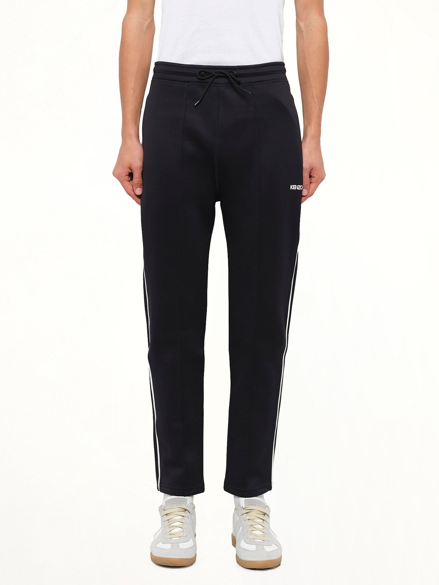 Image of a model wearing Pants. Product name - Kenzo Casual Pants in Black colour by brand - KENZO
