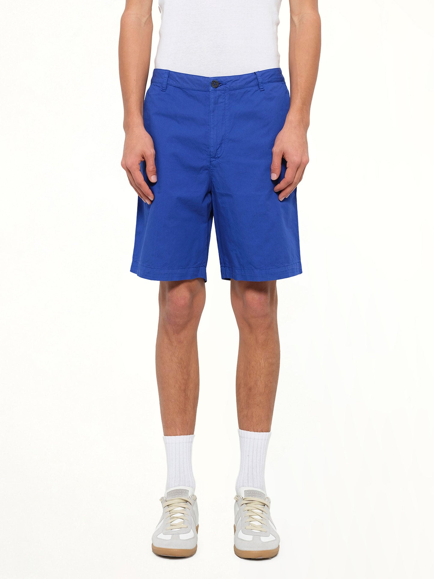 Image of a model wearing Shorts. Product name - Kenzo Shorts in Blue colour by brand - KENZO