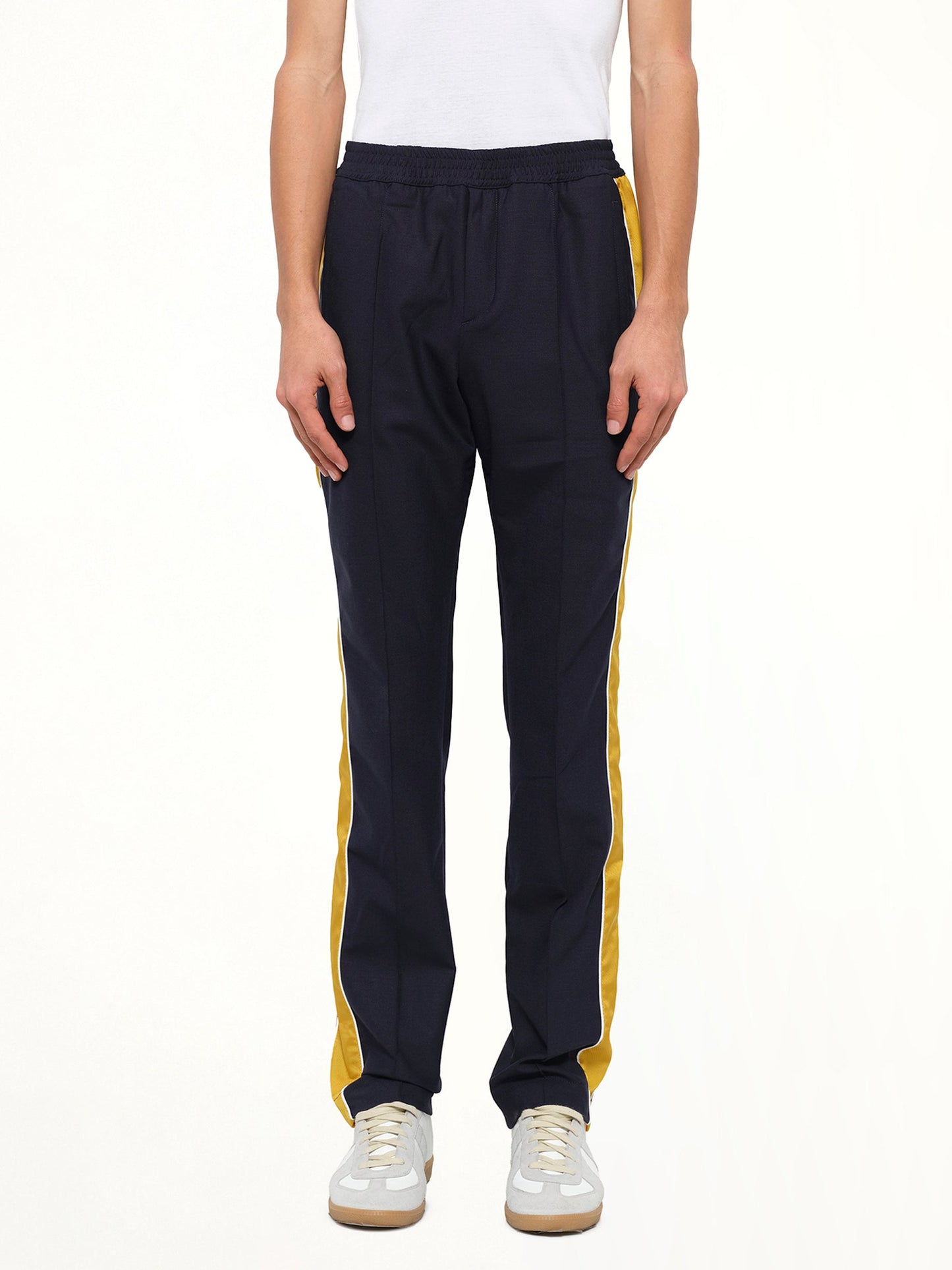Image of a model wearing Pants. Product name - Kenzo Trousers in Ink colour by brand - KENZO