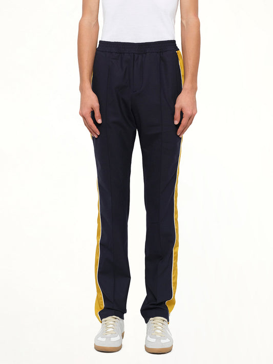 Image of a model wearing Pants. Product name - Kenzo Trousers in Ink colour by brand - KENZO