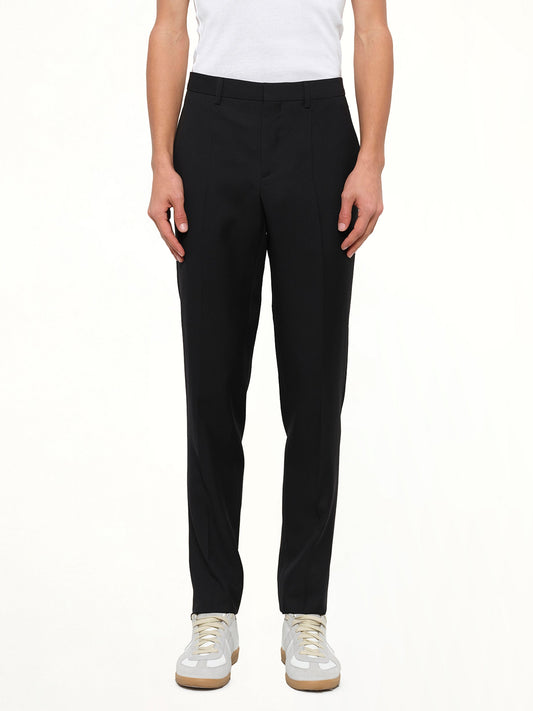 Image of a model wearing Pants. Product name - Pant in Black colour by brand - GIVENCHY