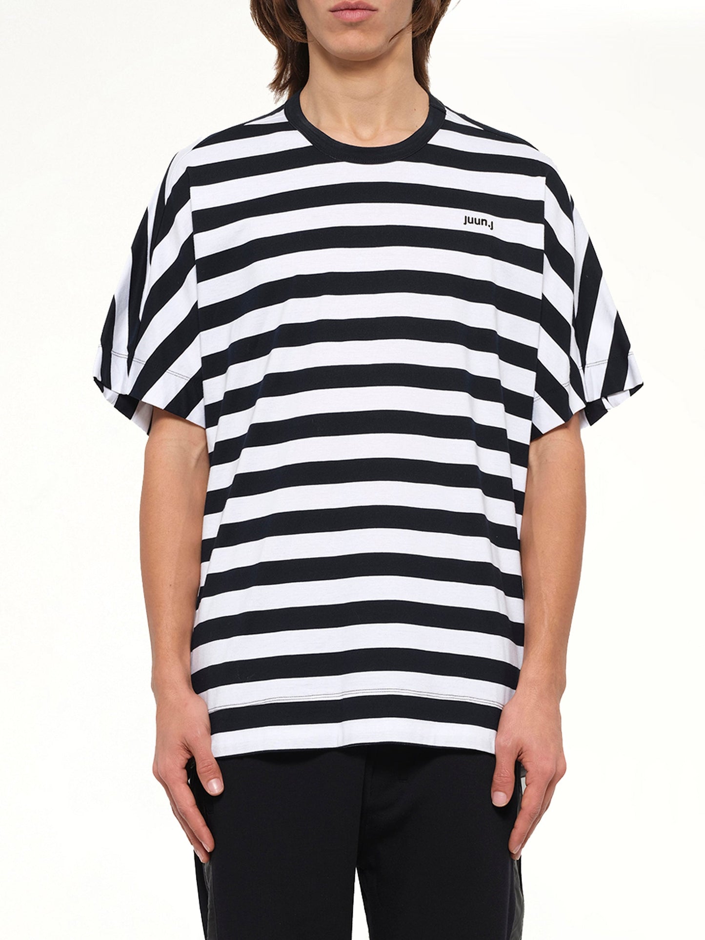 Image of a model wearing Tops. Product name - Striped Top in Black colour by brand - JUUNJ