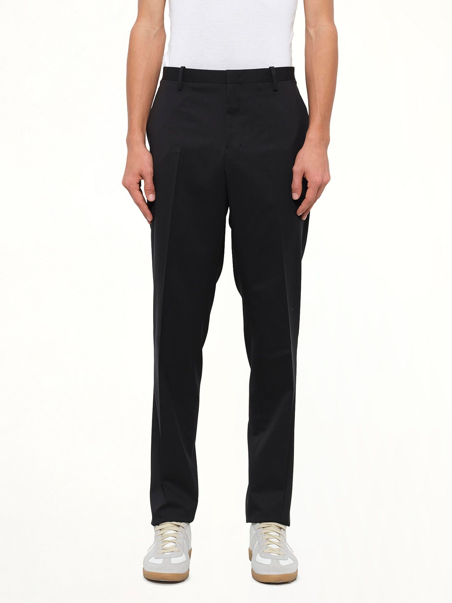 Image of a model wearing Pants. Product name - Suit Pant in Black colour by brand - WOOYOUNGMI
