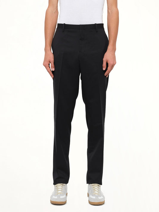 Image of a model wearing Pants. Product name - Suit Pant in Black colour by brand - WOOYOUNGMI