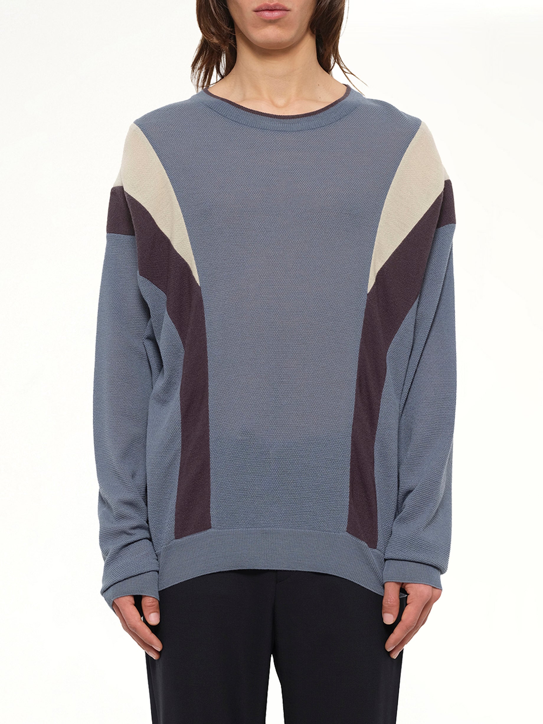 Image of a model wearing Outerwear. Product name - Sweater in Mix colour by brand - WOOYOUNGMI