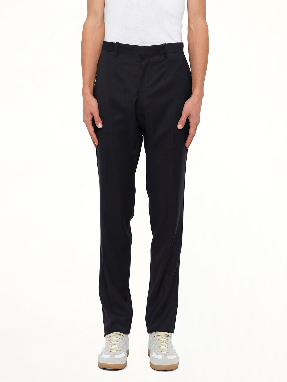 Image of a model wearing Pants. Product name - Wooyoungmi Woven Pants in Navy colour by brand - WOOYOUNGMI