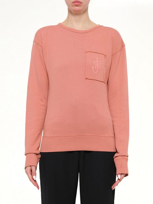 Image of a model wearing Outerwear. Product name - Anchor Patch Sweatshirt in Rose colour by brand - JWA