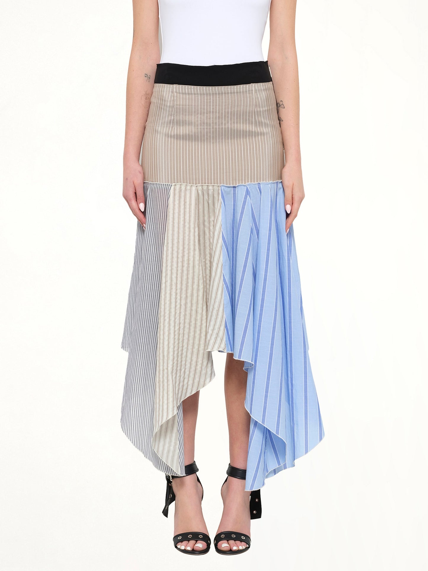 Image of a model wearing Skirts. Product name - JWA Hanky Hem Skirt in Clay colour by brand - JWA