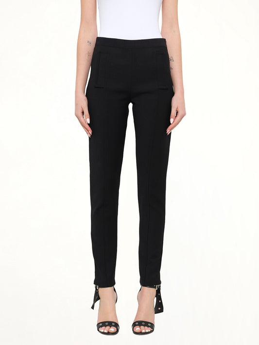 Image of a model wearing Pants. Product name - Neil Barrett Pants in Black colour by brand - NEIL BARRETT